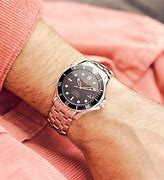 Image result for Omega Seamaster 300M Black Wrist