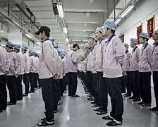 Image result for iPhone Factory Tossing Clothes