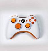 Image result for Xbox 360 S White and Orange