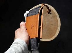 Image result for iPhone 11 Pro Max with Card Holder and Wrist Strap