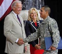 Image result for Joe Biden Holding Sign