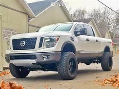 Image result for Nissan Titan with Pro Comp Lift