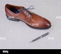 Image result for A Shoe with a Pen Slot On It