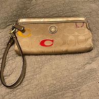 Image result for Coach Poppy Wristlet
