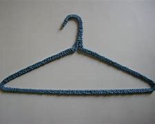 Image result for Wire Coat Hanger with Long Draped Ribbons and Pearls Attached