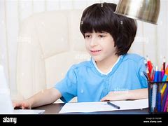 Image result for Boy Doing Homework with Computer