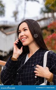 Image result for Side View of Woman On Cell Phone City