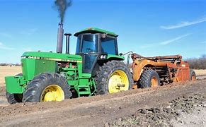 Image result for Tractor Moving Dirt