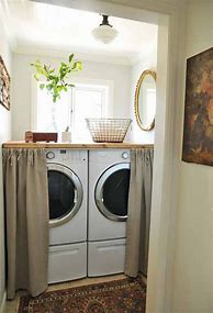 Image result for Hidden Laundry in Linen Closet