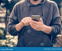 Image result for Person Holding Out an iPhone