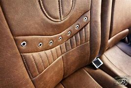Image result for Distressed Red Saddle Leather Seats