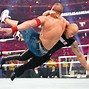 Image result for Rock John Cena Undertaker in WrestleMania