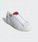 Image result for White Adidas Shell Toe Shoes
