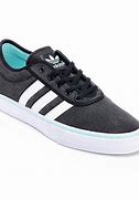 Image result for Black and White Canvas Shoes