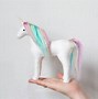 Image result for Pastel Rainbow Unicorn Bop It Smiggle