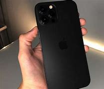 Image result for iPhone 13 Size in Hand