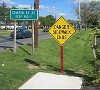 Image result for Sidewalk Ends Here Signs