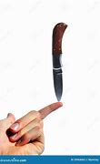 Image result for Balancing Knife On Finger