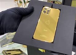 Image result for iPhone 12 Pro Black Case with Gold Phone