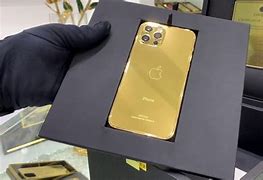 Image result for iPhone 12 Pro Max Gold On Hand