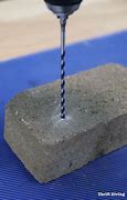 Image result for Drilling Concrete for a Tent