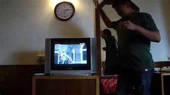 Image result for Slapping Old TV to Fix It
