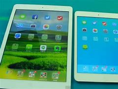 Image result for iPhone 6 Plus Compared to iPad Mini