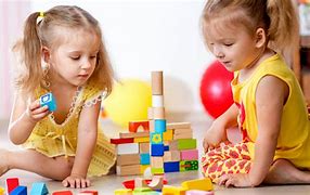 Image result for Toddler Playing with Toys