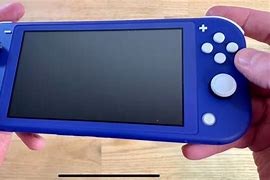 Image result for Nintendo Switch Lite Blue Plainrock124
