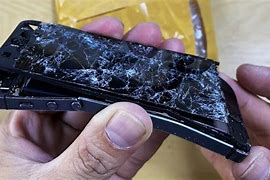 Image result for Pile of Smashed iPhones