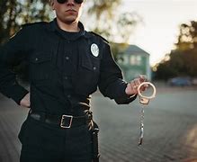 Image result for Police Handcuffs in Hand