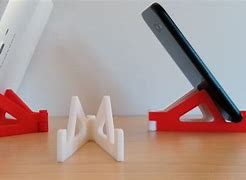 Image result for Phone and Watch Stand