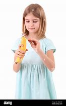 Image result for Little Girl Holding a Banana