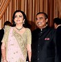 Image result for Nita Ambani Hold Up by Cricketer
