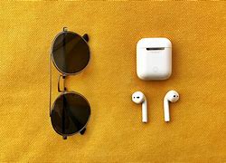Image result for iPhone 7 Plus Red Air Pods