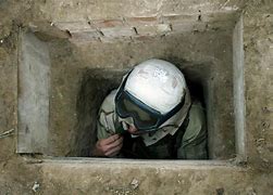Image result for saddam in rat hole