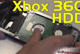 Image result for Xbox 360 Slim Disc Drive Motor Spindle Tear Down