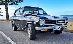 Image result for Datsun 1200 Deluxe