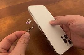 Image result for How to Install a iPhone Sim Card