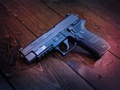 Image result for Sig Sauer 365 XL with Silencer