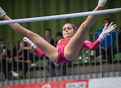 Image result for Girls Gymnastics Uneaven Bars