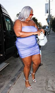 Image result for Lizzo in Purple Dress