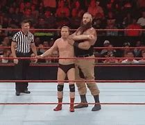 Image result for Spinning Facebuster GIF WWE