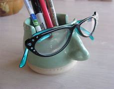 Image result for Hand Eyeglass Holder