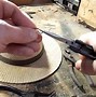 Image result for How to Put a Fishing Hook On a Hat