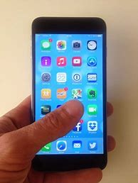 Image result for iPhone 6s Plus Size in Hand