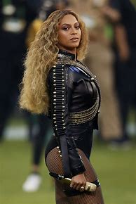 Image result for Beyoncé Black Feather Dress