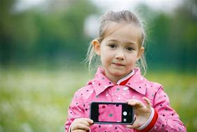 Image result for Little Girl Holding Phone Shutterstock