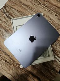 Image result for iPad Mini in Hand 6th Gen