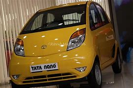 Image result for Tata Nano Yellow